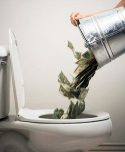 pouring a bucket of money into the toilet